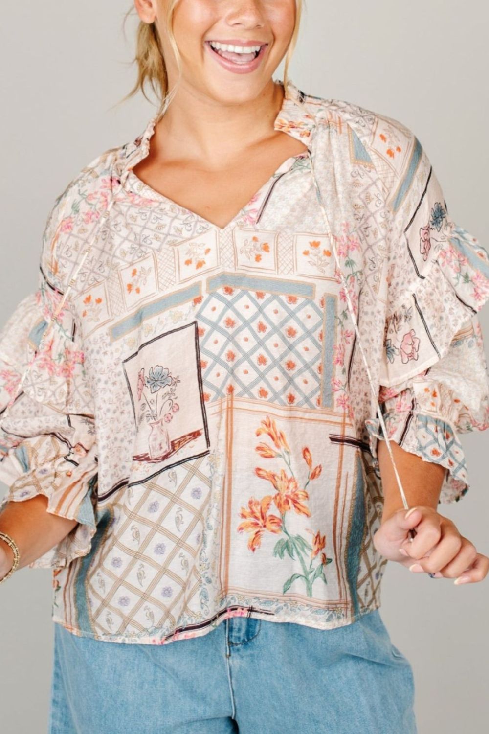 Ruffled Printed Tie Neck Three-Quarter Sleeve Blouse