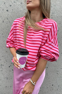 pink stripped sweatshirt, pink sweatshirt, pink long sleeve , stripe pattern , stripped sweatshirt, cute sweatshirt, womens sweatshirts, comfortable , womens lounge wear , casual sweatshirts , 2024 trends , kesley fashion, trendy sweatshirts , womens casual sweatshirts , tiktok trends, stripe trend , pink and red stripes , cute and comfy, winter and fall trends , cute gift ideas , everyday sweatshirts , womens basics, school sweatshirts,  womens basics, fashionable sweatshirts, everyday basics , girly