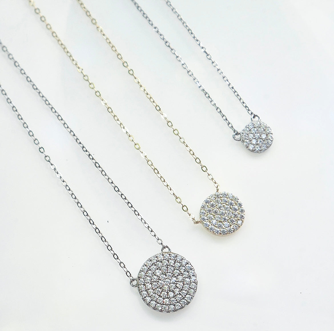 Circle Diamond pave CZ Cubic zirconia .925 sterling silver necklaces waterproof large circle tiny circle rhinestone necklace that wont turn green shopping in Miami, jewelry store in Brickell Kesley Boutique cute dainty necklaces Layering necklace ideas necklaces for layering birthday gift holiday gift ideas trending outift ideas influencer outfits and jewelry 