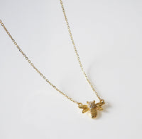 Gold bee necklace 18k gold plated over .925 sterling silver with diamond zircon. Lucky necklaces bee jewelry trending gift idea Kesley Boutique