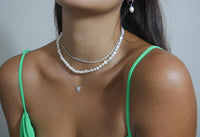 tennis necklace tennis choker waterproof chokers Layering necklaces pearls with tennis necklace and heart how to layer three necklaces Kesley Boutique necklavce layering Miami, shopping in Miami Brickell tennis choker tennis necklace how to layer necklaces Kesley Boutique shopping in brickell Pearl jewelry pearl choker necklaces real pearl jewelry