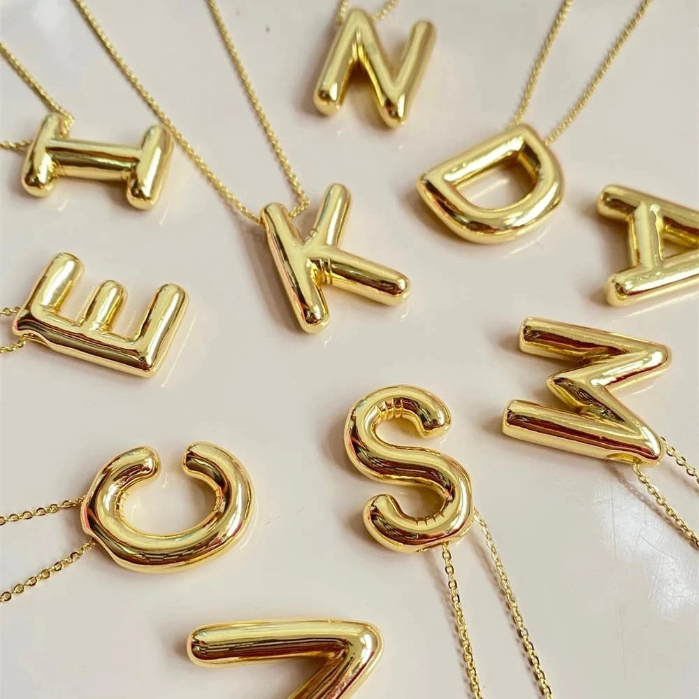 name necklaces, bubble letter necklaces, initial necklaces, gold plated necklaces, gift ideas, tarnish free necklaces, waterproof jewelry, gold plated jewelry, nice gold plated necklaces, cute gold plated jewelry, trending fashion, kesley fahsion, kesley jewelry, instagram jewelry, tiktok jewelry, viral jewelry