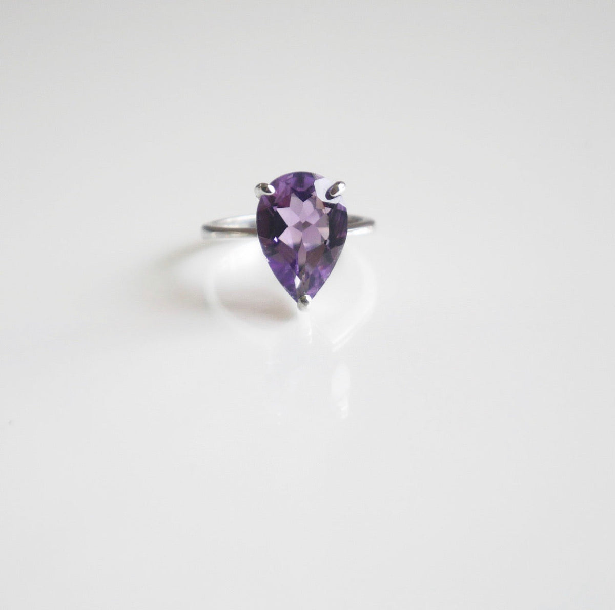 Amethyst ring white gold sterling silver amethyst ring. February gemstone ring. Purple ring. chakra ring. good luck ring. amethyst crystals. jewelry with crystals. cocktail ring. designer inspired cocktail ring. designer inspired rings. tiffany's inspired ring. engagement ring with gemstone. amethyst engagement ring. wedding rings with amethyst size 6. size 7. size 8 ring. vacation jewelry. Bridesmaids jewelry. Gift ideas . shopping in Miami, Brickell. Kesley Boutique
