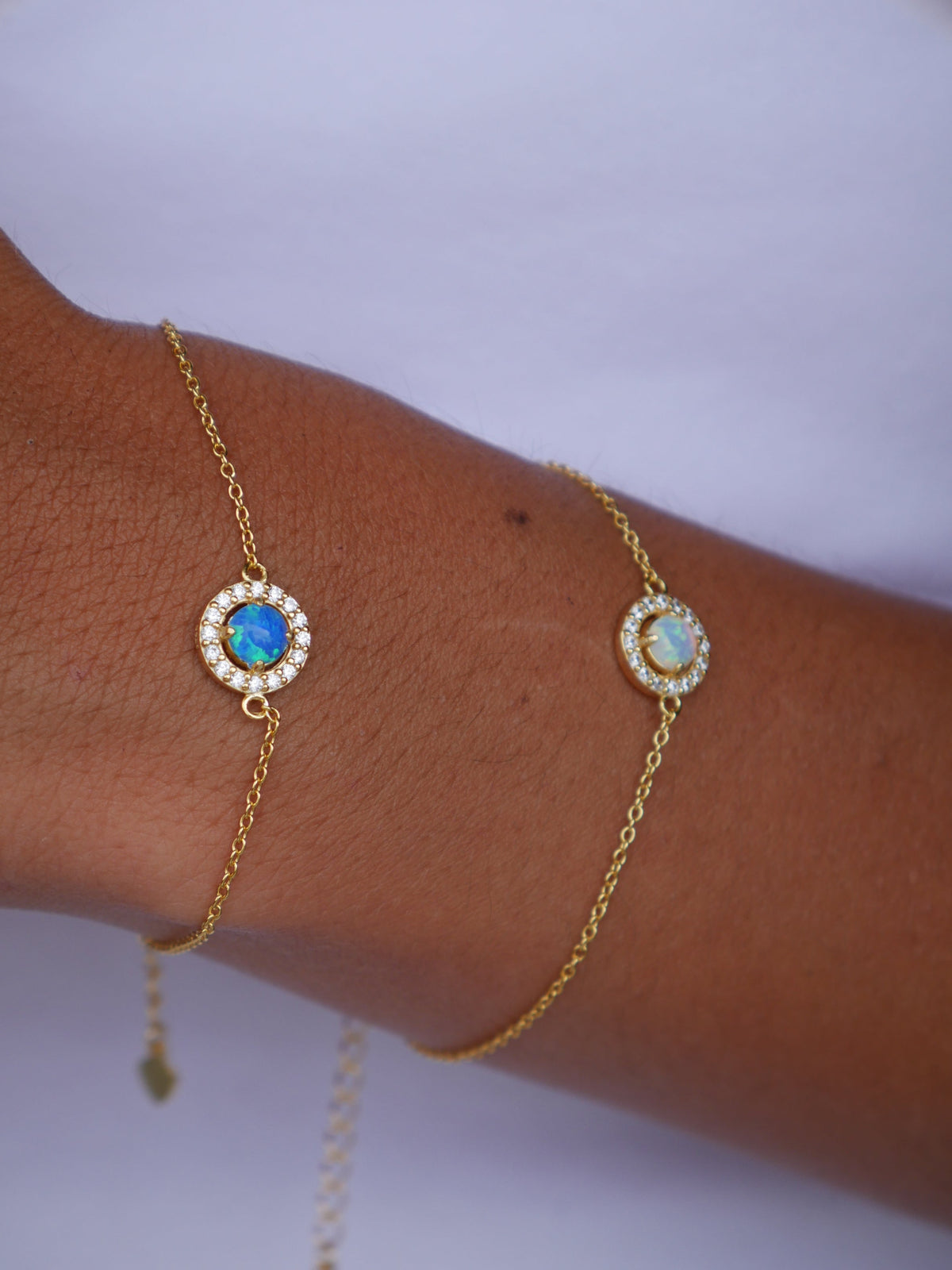 bracelets, gold bracelets, opal bracelets, opal bracelet, opal jewelry, october birthstone jewelry, white opal bracelets, blue opal bracelets, dainty bracelets, trending jewelry on tiktok and instagram, dainty jewelry, birthday gift idea, fashion jewelry, nickel free, statement bracelets, cute bracelets, affordable jewelry, sterling silver 925 bracelets, cubic zirconia bracelets, gift ideas, anniversary, birthday, best friend bracelets