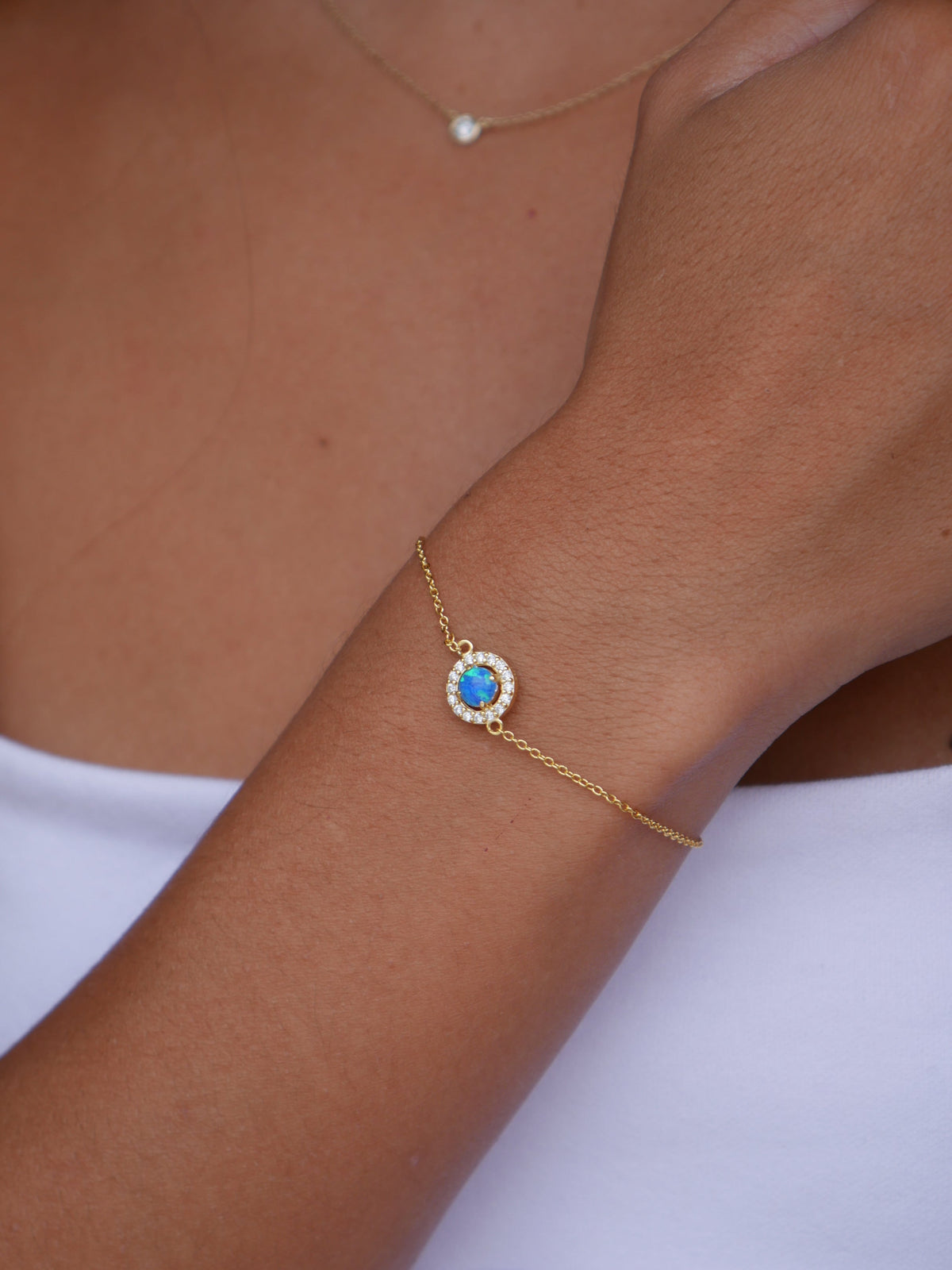 bracelets, gold bracelets, opal bracelets, opal bracelet, opal jewelry, october birthstone jewelry, white opal bracelets, blue opal bracelets, dainty bracelets, trending jewelry on tiktok and instagram, dainty jewelry, birthday gift idea, fashion jewelry, nickel free, statement bracelets, cute bracelets, affordable jewelry, sterling silver 925 bracelets, cubic zirconia bracelets, gift ideas, anniversary, birthday, best friend bracelets