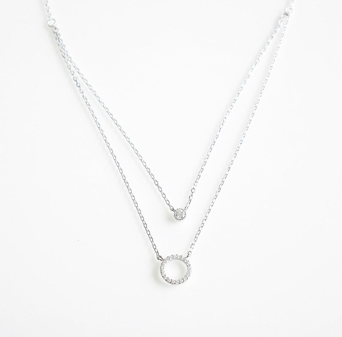 layered necklaces diamond zircon .925 sterling silver , circle necklace for everyday, work necklaces wont tarnish or turn green. Everyday jewelry. Gift ideas jewelry store Miami, things to do in Miami Kesley Boutique