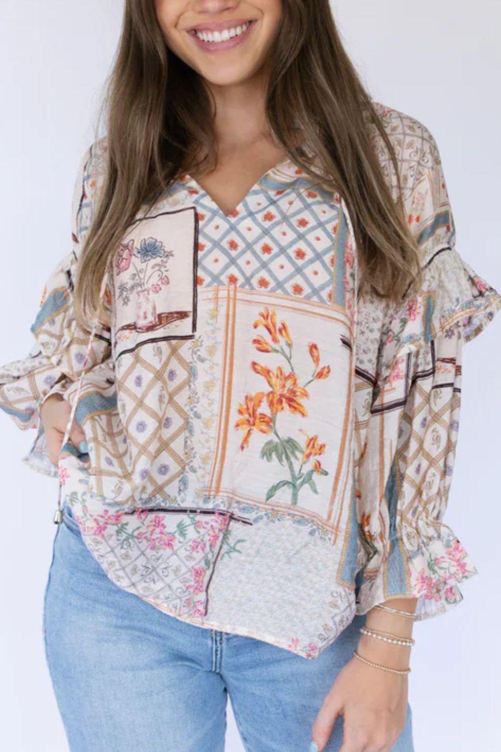 Ruffled Printed Tie Neck Three-Quarter Sleeve Blouse