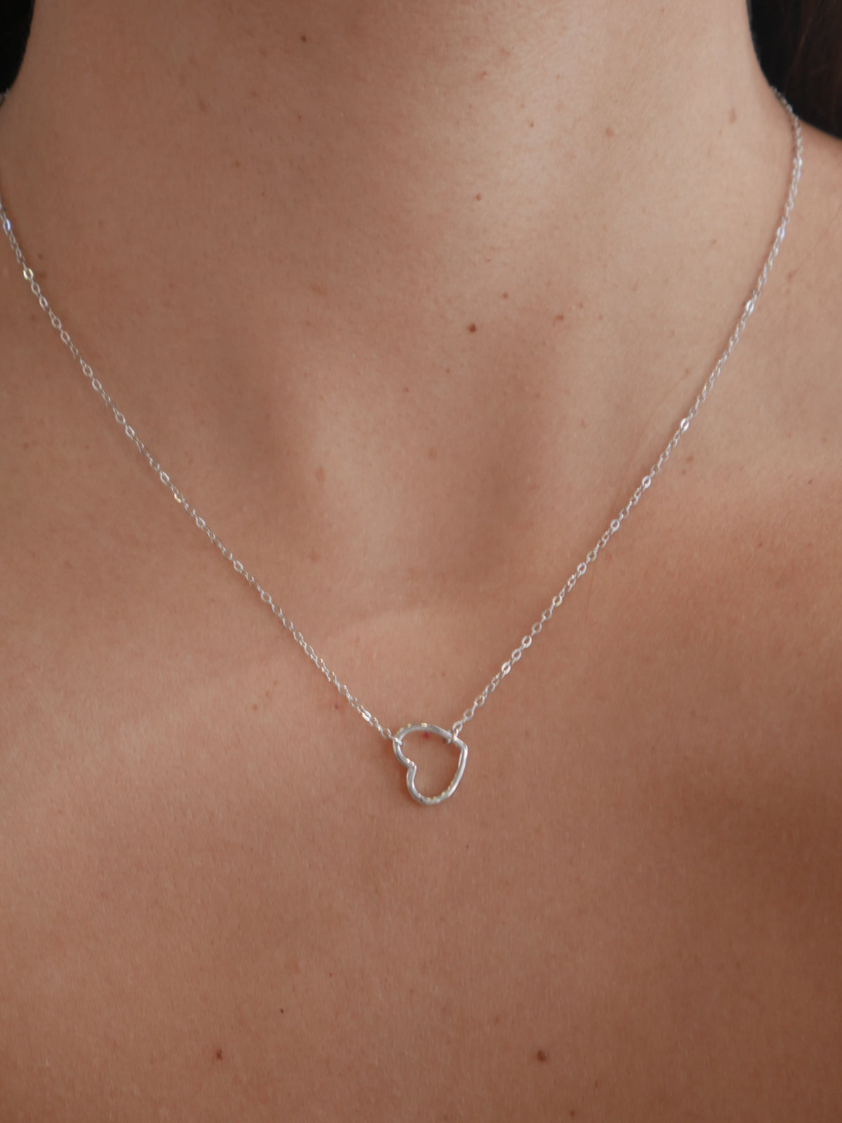 necklaces, silver, heart plain dainty necklace, sterling silver waterproof heart necklaces, hypoallergenic, dainty necklaces, popular, unique, designer inspired, influencer necklaces, trending on instagram and tiktok