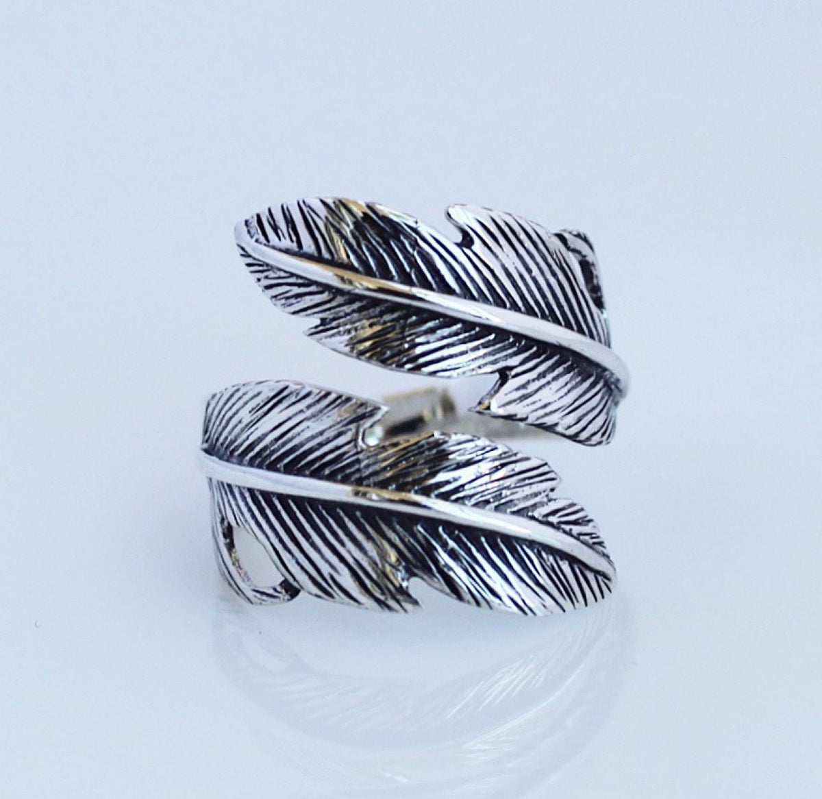 rings, silver rings, adjustable rings, 925 silver rings, feather rings, fashion. jewelry, statement jewelry, long rings, long silver rings, ring with a leaf, ring for men, rings for women, trending jewelry, fashion jewelry, statement jewelry, statement rings, gift ideas, rings for the middle finger, nice jewelry, ring for the middle finger, accessories, silver accessories, nice rings, designer rings, kesley jewelry, kelsey,  feather ring