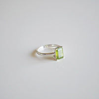 Peridot gemstone Ring. August Birthstone ring. Green ring. Rectangle ring. lime green ring. Dainty rings for men and woman. Waterproof ring with crystals for chakra healing and good luck. Lucky rings for wealth and money. crystals for good luck. Crystal for August. Cute rings. trending, popular, unique, dainty, wont tarnish or turn green. Influencer dainty rings. Shopping in Miami, brickell. 