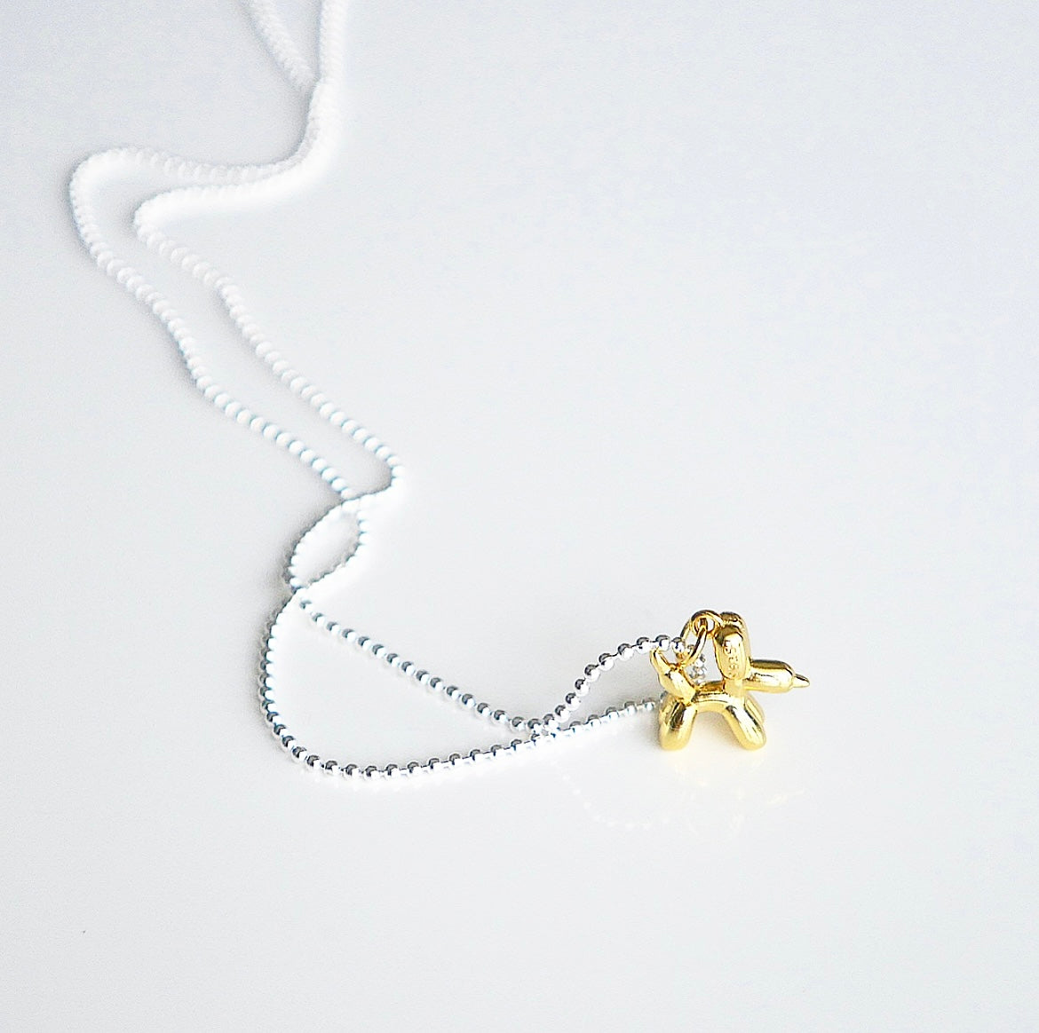 balloon dog necklace gold plated sterling silver waterproof dainty unique necklaces, dog lovers jewelry, dainty unique necklaces, trending, popular, influencer fashion trending on instagram and tiktok kesley boutique, jewelry store in Miami, brickell 