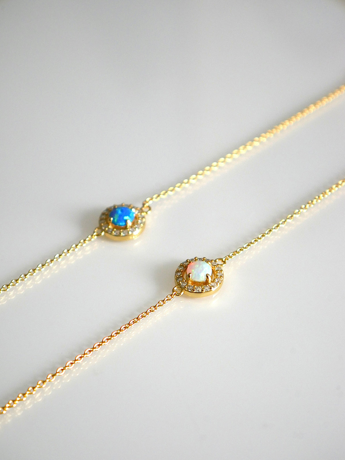 bracelets, gold bracelets, opal bracelets, opal bracelet, opal jewelry, october birthstone jewelry, white opal bracelets, blue opal bracelets, dainty bracelets, trending jewelry on tiktok and instagram, dainty jewelry, birthday gift idea, fashion jewelry, nickel free, statement bracelets, cute bracelets, affordable jewelry, sterling silver 925 bracelets, cubic zirconia bracelets, gift ideas, anniversary, birthday, best friend bracelets