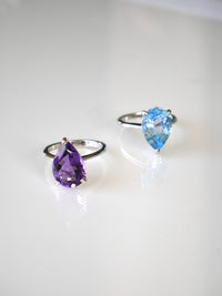 rings, silver rings, 925, amethyst rings, blue topaz rings, birthstone rings, birthstone jewelry, blue rings, purple rings, cocktail ring, pear shape rings, engagement birthstone rings , white gold rings, trending on tiktok and instagram, cool jewelry, casual rings, popular brand, ring , fashion jewelry, luxury jewelry, luxury rings, dainty rings, 