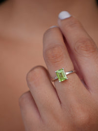 Silver rings, 925, peridot rings, peridot gemstone rings, emerald cut, birthstone rings, birthstone jewelry, august birthstone rings, nickel free jewelry, fashion jewelry, nice rings, gift ideas, prong rings, green rings, dainty rings, trending on instagram and tiktok, jewelry, store in in brickell Miami, nice jewelry, birthday gift ideas, engagement peridot rings, fine jewelry, affordable jewelry, designer jewelry