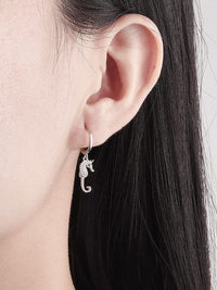 seahorse earrings, sea horse hoop earrings, gold earrings, gold plated earrings, huggie earrings with charms, hoop earrings with charms, birthdya gifts, anniversary gifts, holiday gifts, cool jewelry, cool earrings, cheap earrings, good quality earrings, minimalist earrings, minimalist jewelry, trending on tiktok, jewelry store in Miami, cute earrings, seahorse jewelry , beach jewelry, ocean jewelry, sterling silver earrings, 925 hoop earrings
