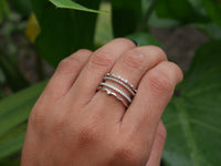 size 4 rings waterproof sterling silver .925. Everyday waterproof rings. Rings for small fingers. Rings for big fingers. Designer inspired rings. Stacked rings. Rhinestone rings for cheap, good quality, will not turn green. white gold stacked rings, dainty for men and woman. Kesley Boutique. Jewelry Store in Miami. Vacation jewelry. things to do in Miami. influencer rings. ootd