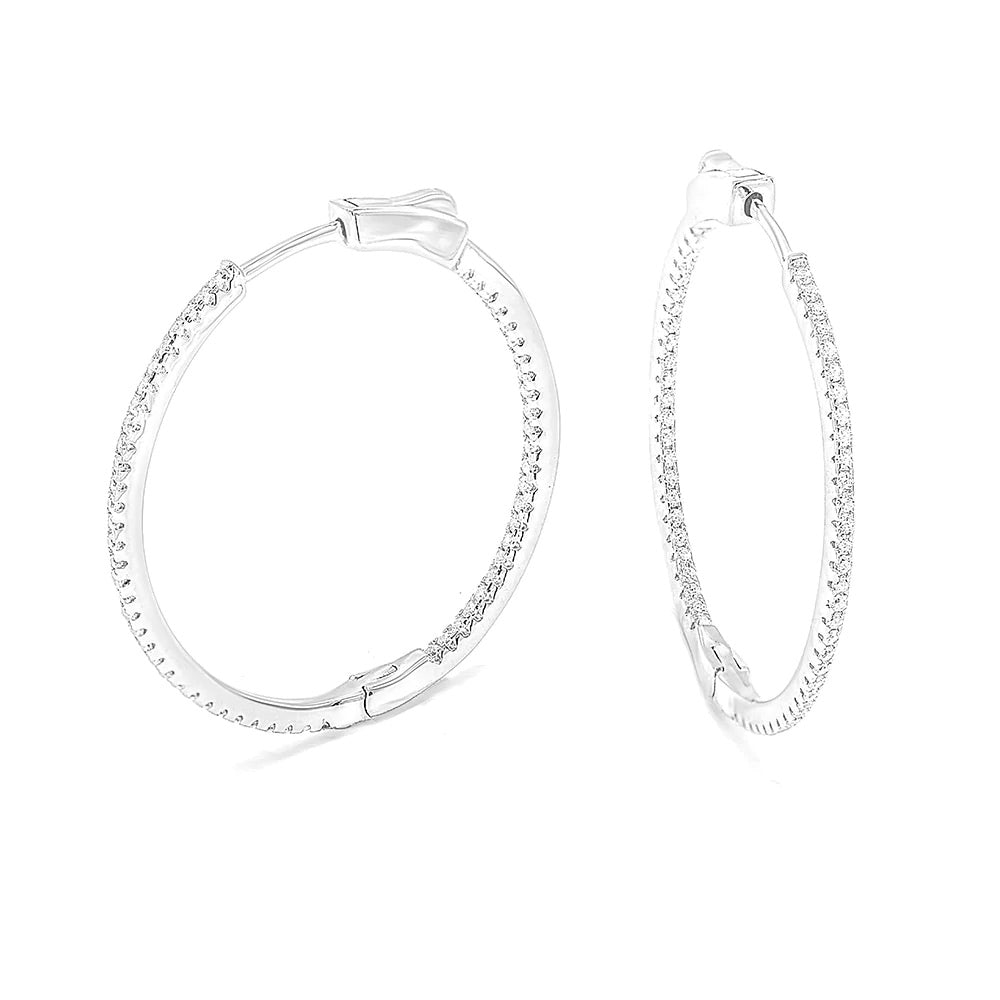 medium hoop earrings with diamonds inside and outside zircon cz sterling silver hoop earrings with fake diamonds that look real and secure clasp for sensitive ears. Medium hoop earrings for everyday, nice, trending, popular work earrings. Thin everyday diamond hoop earrings simulation -sterling silver .925 good quality hoop earrings Kesley Boutique 