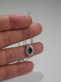necklaces, dainty, .925, Emerald Green necklaces .925 sterling silver with diamond cz rhinestone cubic zirconia. Pear shape necklace with diamond cz halo. sterling silver white gold. Green and silver Necklaces, Wedding jewelry. Bridesmaids Necklaces. Unique everyday necklaces, waterproof. Influencer brands trending on instagram and tiktok. Cute necklaces. Classy necklace. Designer inspired jewelry and necklaces. OOO outfot of the day examples and ideas. Jewelry store in Miami, Brickell Kesley boutique